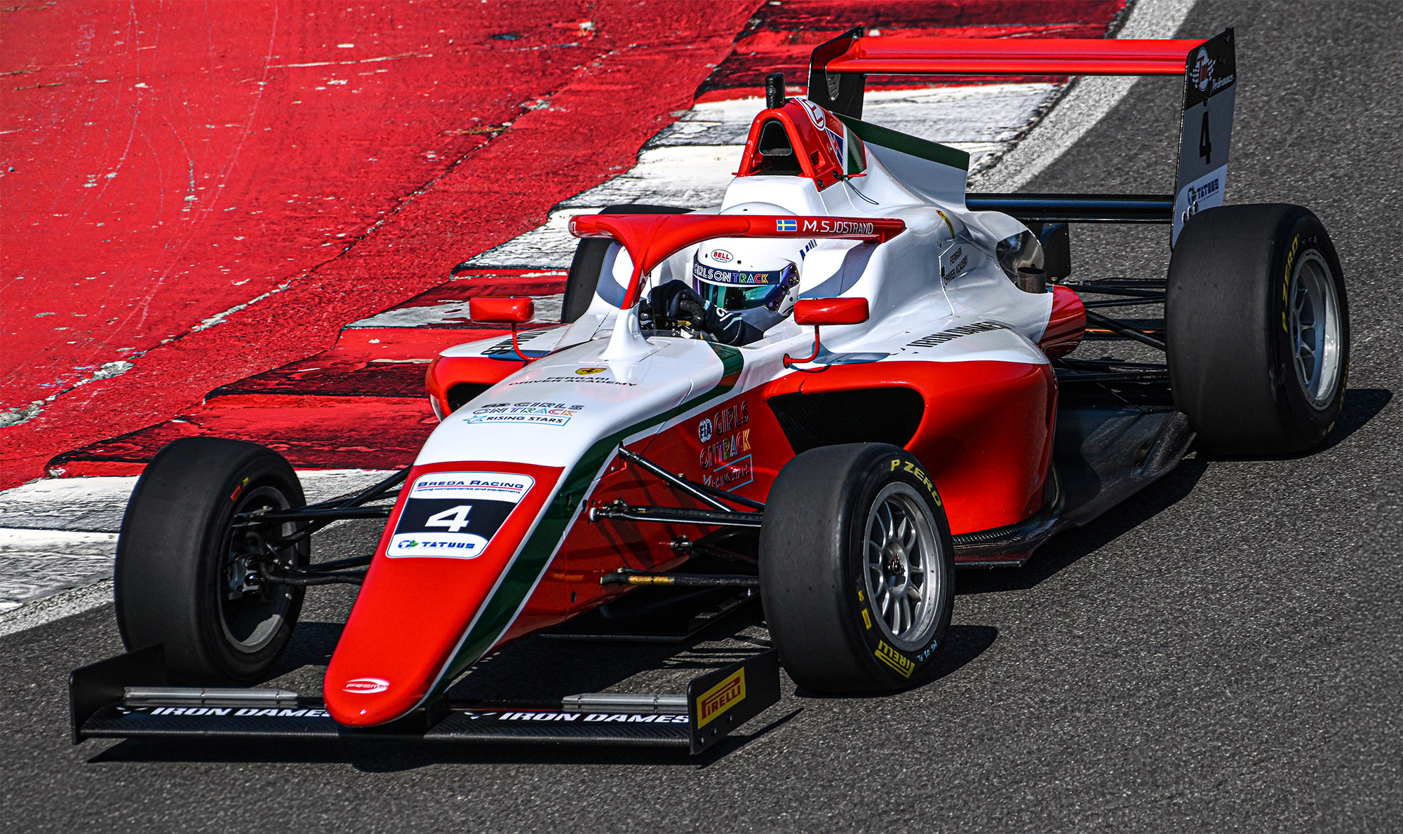 Milla driving a Formula 4 car.